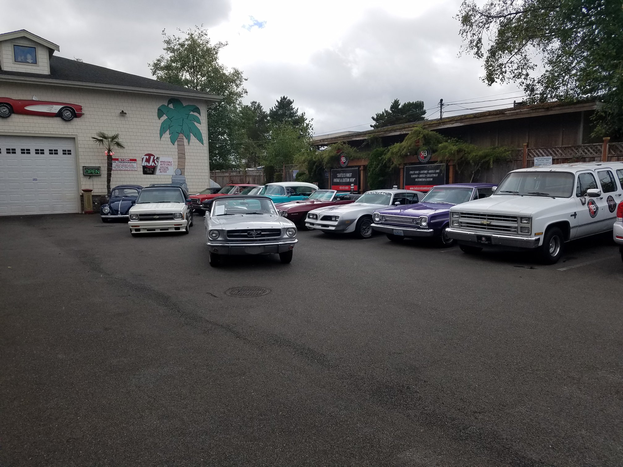Classic cars parked outside the former dealership